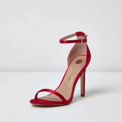 Red barely there heeled sandals